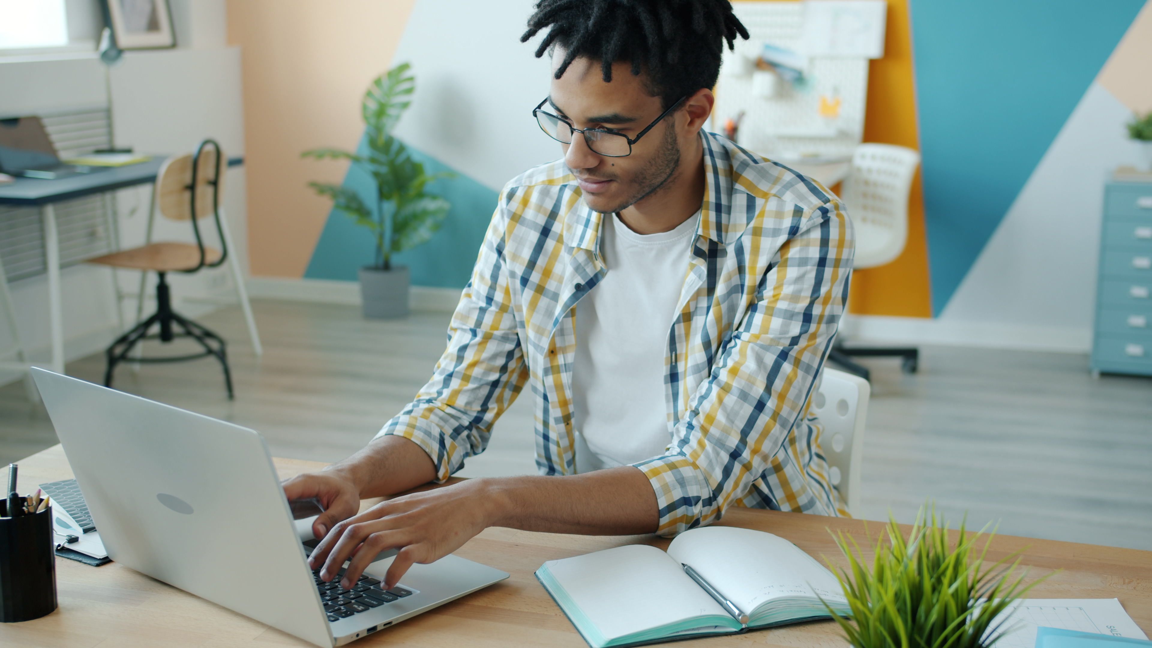 Student using modern digital tools for academic work
